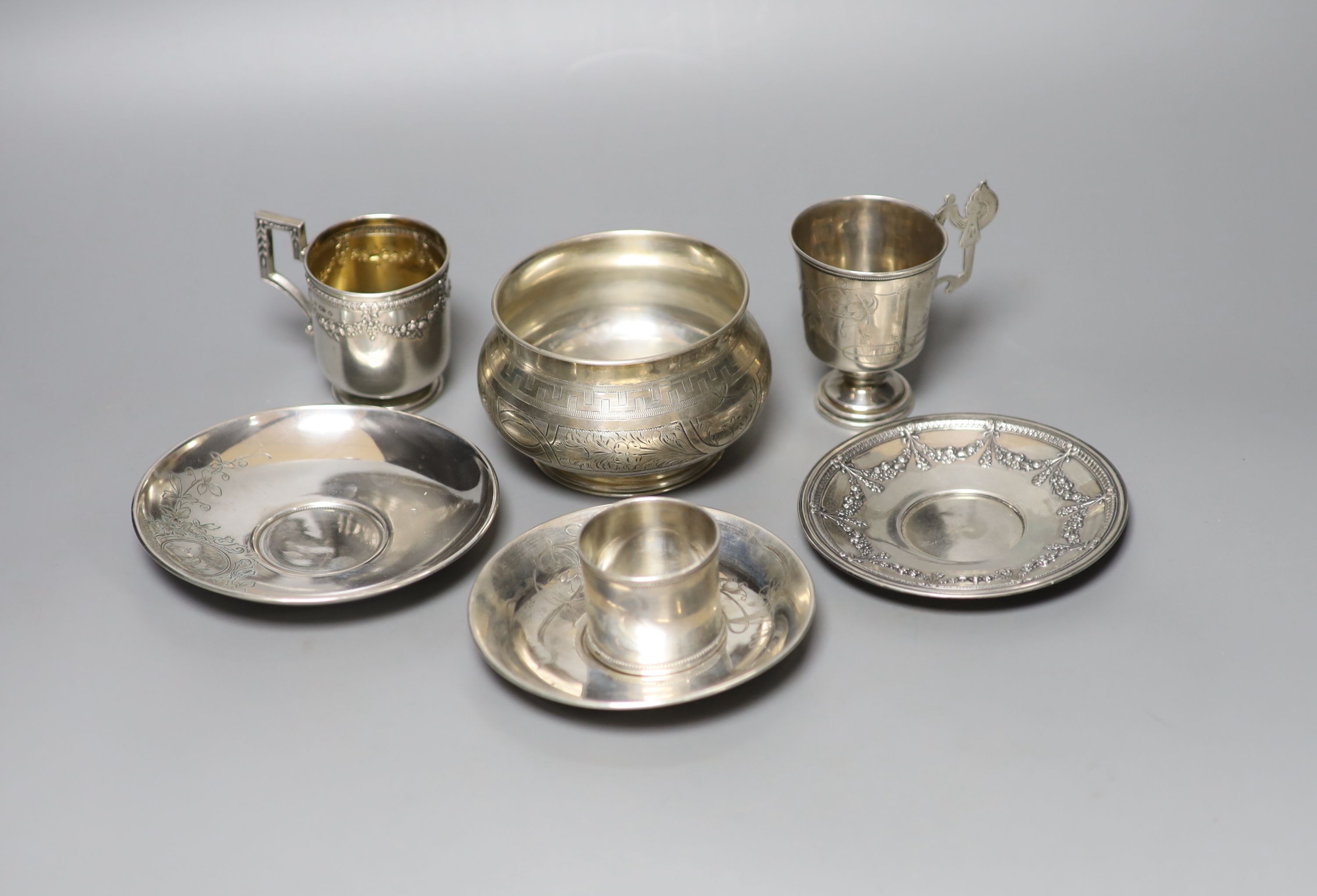Two early 20th century Russian 84 zolotnik cups and saucers, one other saucer, napkin ring and sugar bowl